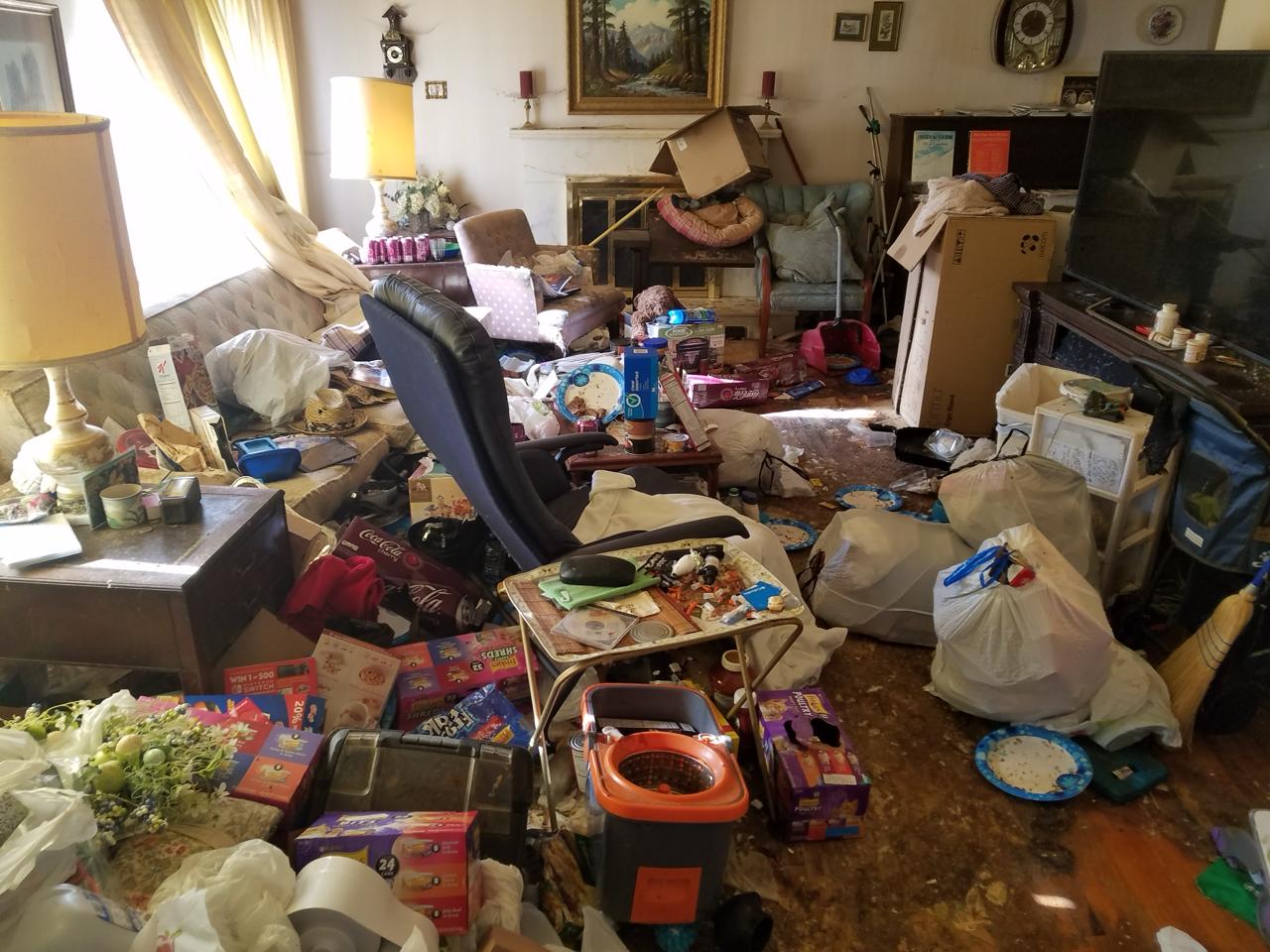 Hoarding situation before cleanup - property filled with accumulated items